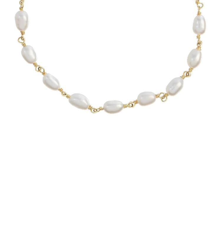 Anna Nina - Clutching pearls